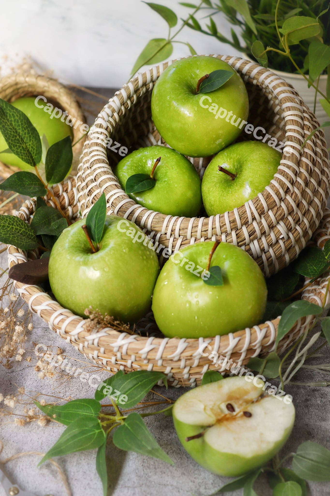 Green apples inside a basket